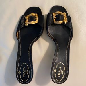 Prada mule with gold buckle